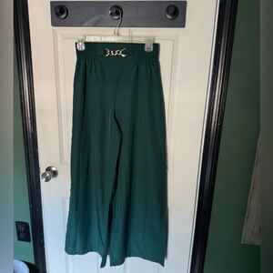 Chic Green Wide-Leg Pants with Gold Accent